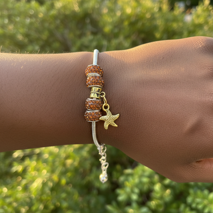 Amber starfish bracelet on wrist