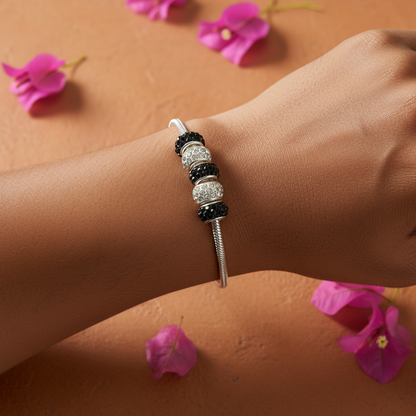Black & White Bracelet on wrist - terracotta bougainvillea