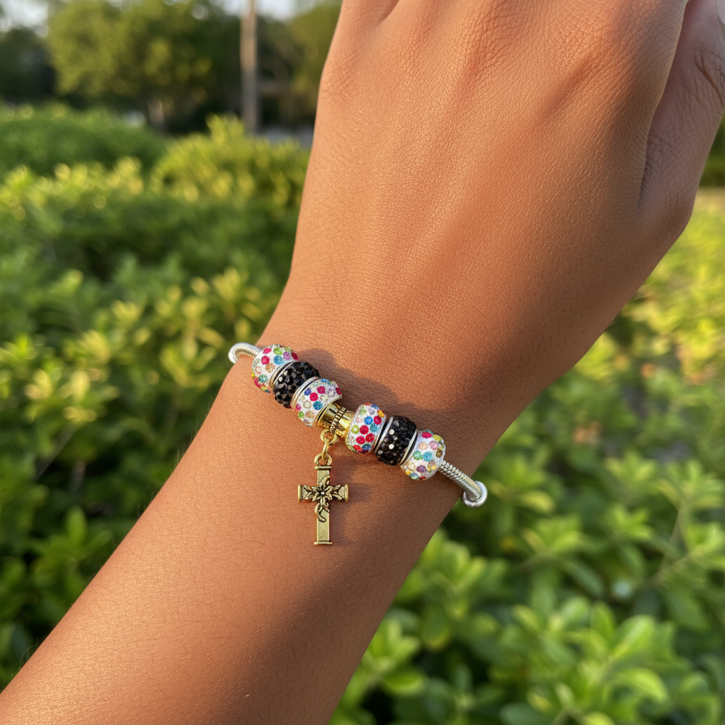 Black white cross bracelet worn on wrist
