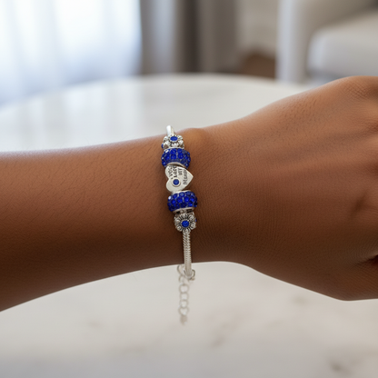 Blue heart bracelet on wrist