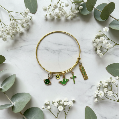 Bracelet on white marble with eucalyptus