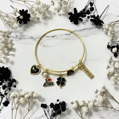 Bracelet on white marble with florals
