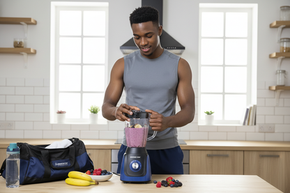 Fit man making post-workout smoothie