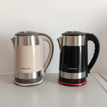 German Chef cream white and black kettles side by side on kitchen counter