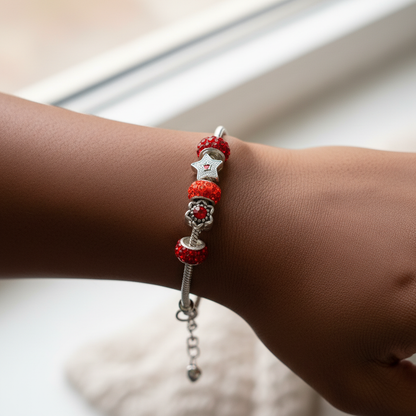 Red star bracelet on wrist